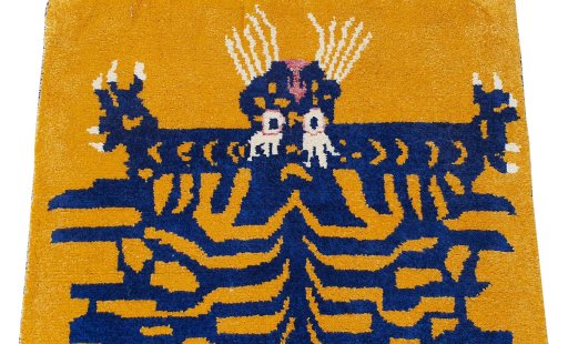 Backside of handmade New Morocco rug showing knot structure and weave density