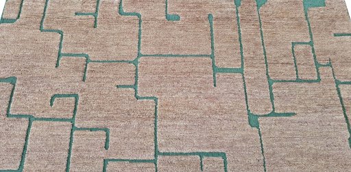 Backside of handmade New Morocco rug showing knot structure and weave density