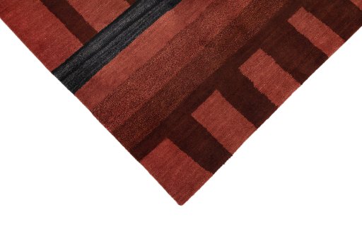Backside of handmade New Nepal Carpets rug showing knot structure and weave density