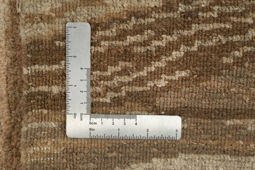Full view of New Nepal Carpets rug from Nepal, 163 × 91 cm in Brown tones