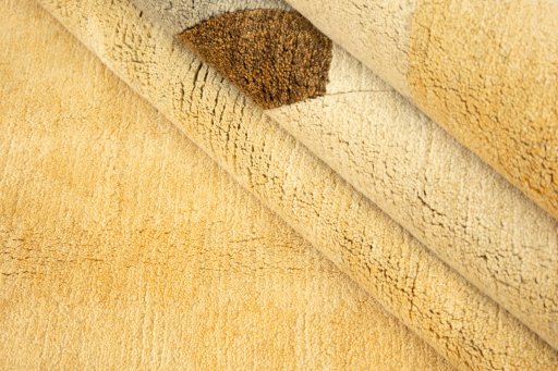 Full view of New Nepal Carpets rug from Nepal, 361 × 272 cm in Cream tones