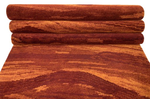 Full view of New Nepal Carpets rug from Nepal, 305 × 89 cm in Red tones