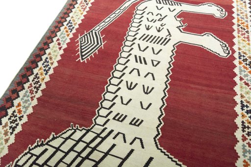 Surface texture of 2000s Kilim Dastan rug with natural Wool and intricate pattern