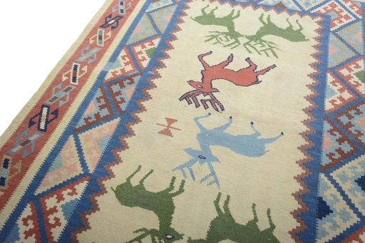 Surface texture of 2000s Kilim Dastan rug with natural Wool and intricate pattern