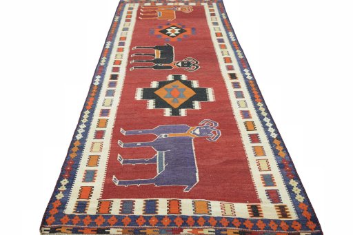 Close-up detail of 2000s Kilim Dastan rug from Iran / Persia showing Wool weave