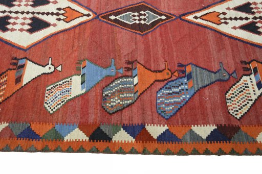Close-up detail of 2000s Kilim Dastan rug from Iran / Persia showing Wool weave