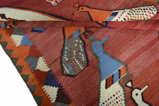 Full view of 2000s Kilim Dastan rug from Iran / Persia, 282 × 164 cm in Red tones