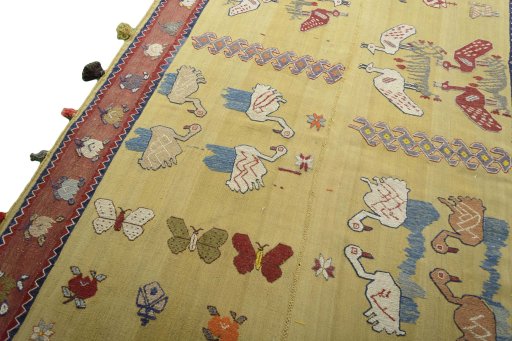 Surface texture of 1970s Kilim Dastan rug with natural Wool and intricate pattern