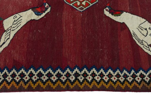 Close-up detail of 2000s Kilim Dastan rug from Iran / Persia showing Wool weave