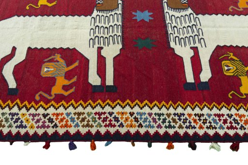 Close-up detail of 2000s Kilim Dastan rug from Iran / Persia showing Wool weave