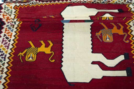 Full view of 2000s Kilim Dastan rug from Iran / Persia, 295 × 164 cm in Red tones