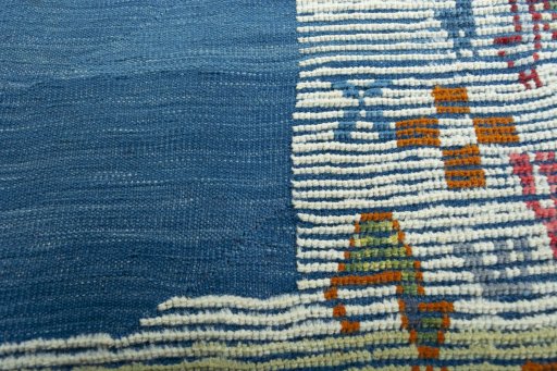 Backside of handmade New Kilim Dastan rug showing knot structure and weave density