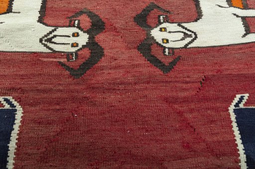 Backside of handmade 1970s Kilim Dastan rug showing knot structure and weave density