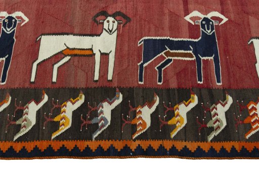 Close-up detail of 1970s Kilim Dastan rug from Iran / Persia showing Wool weave