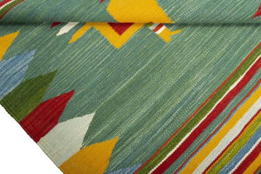 Close-up detail of New Kilim Dastan rug from Iran / Persia showing Wool weave