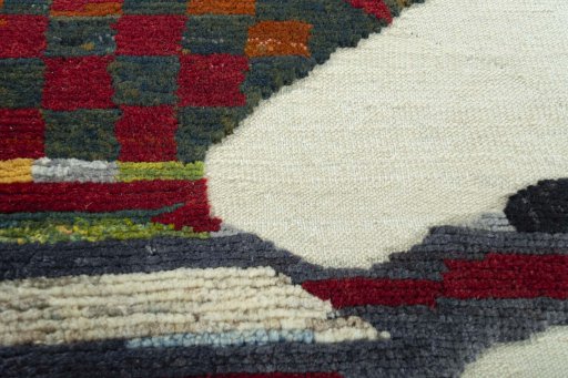 Backside of handmade New Kilim Dastan rug showing knot structure and weave density