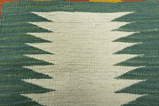 Backside of handmade New Kilim Dastan rug showing knot structure and weave density