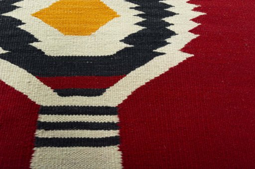 Backside of handmade New Kilim Dastan rug showing knot structure and weave density