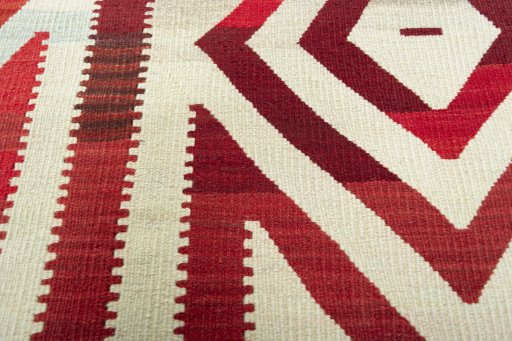 Backside of handmade New Kilim Dastan rug showing knot structure and weave density