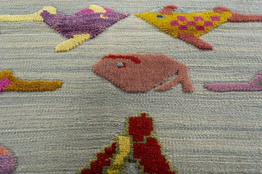 Backside of handmade New Kilim Dastan rug showing knot structure and weave density