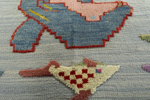 Backside of handmade New Kilim Dastan rug showing knot structure and weave density