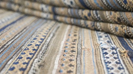 Corner detail of 1920s Kilim Jajim rug showing border pattern and Wool pile