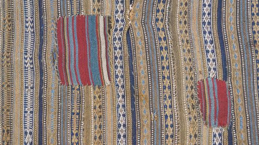 Close-up detail of 1920s Kilim Jajim rug from Iran / Persia showing Wool weave