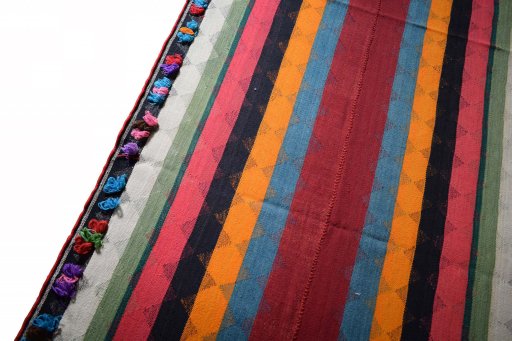 Surface texture of 2000s Kilim Jajim rug with natural Wool and intricate pattern