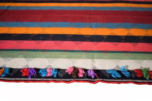 Close-up detail of 2000s Kilim Jajim rug from Iran / Persia showing Wool weave