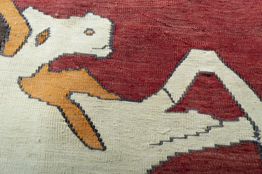 Backside of handmade New Kilim Jajim rug showing knot structure and weave density