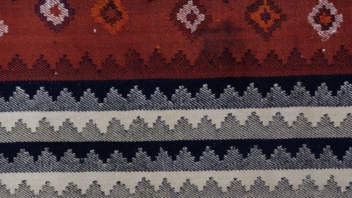 Close-up detail of 1950s Kilim Jajim rug from Iran / Persia showing Wool weave