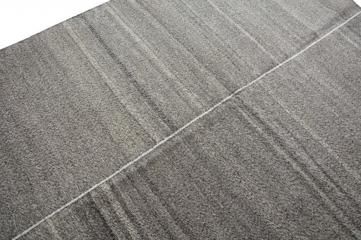 Backside of handmade New Kilim Kiasar rug showing knot structure and weave density
