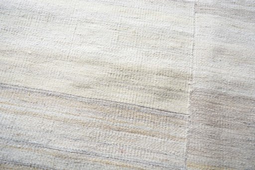 Backside of handmade New Kilim Kiasar rug showing knot structure and weave density