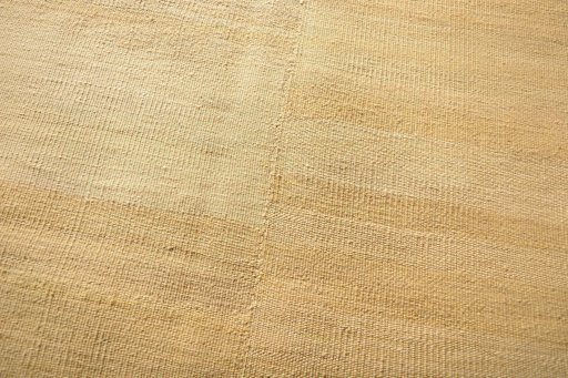 Backside of handmade New Kilim Kiasar rug showing knot structure and weave density