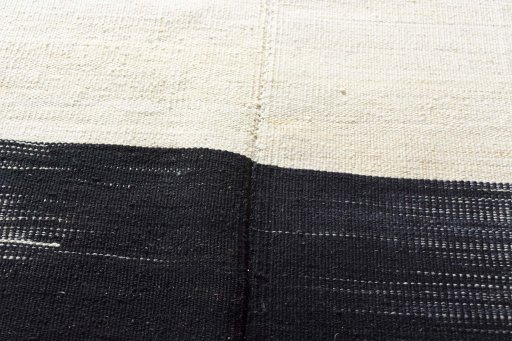 Backside of handmade New Kilim Kiasar rug showing knot structure and weave density