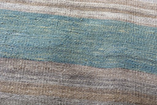 Backside of handmade New Kilim Kiasar rug showing knot structure and weave density