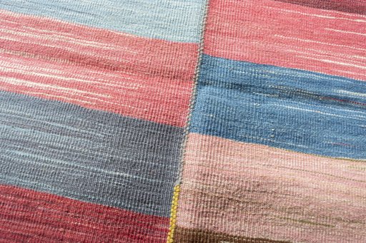 Backside of handmade New Kilim Kiasar rug showing knot structure and weave density