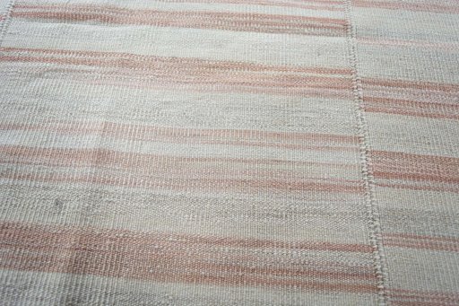 Backside of handmade New Kilim Kiasar rug showing knot structure and weave density