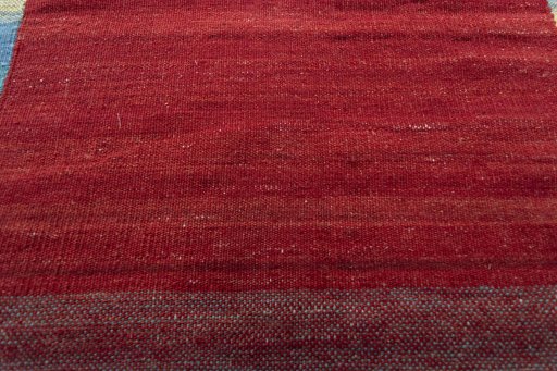 Backside of handmade New Kilim Kiasar rug showing knot structure and weave density