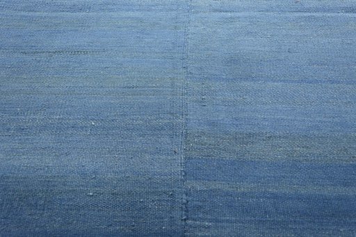 Backside of handmade New Kilim Kiasar rug showing knot structure and weave density