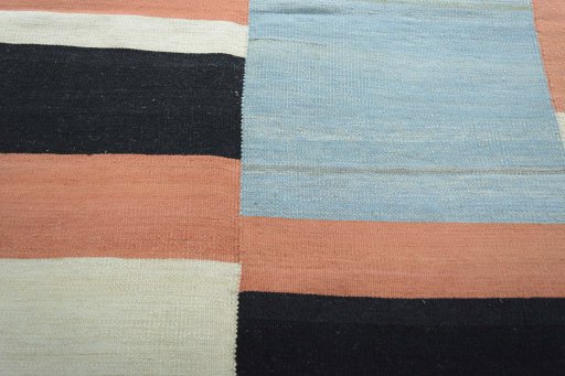 Backside of handmade New Kilim Kiasar rug showing knot structure and weave density