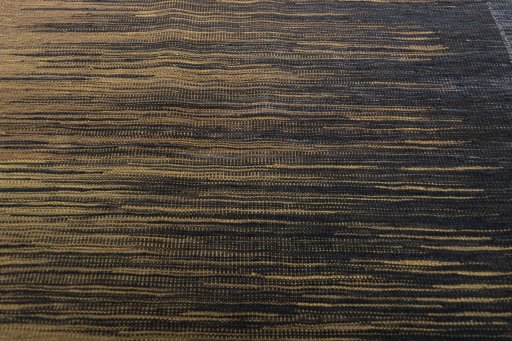 Backside of handmade New Kilim Kiasar rug showing knot structure and weave density