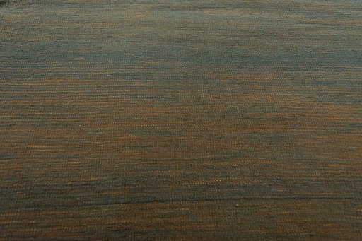 Backside of handmade New Kilim Kiasar rug showing knot structure and weave density