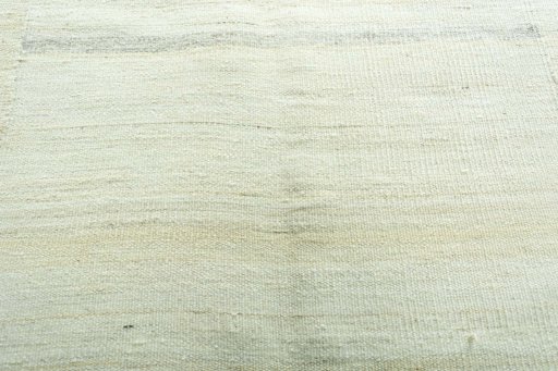 Backside of handmade New Kilim Kiasar rug showing knot structure and weave density
