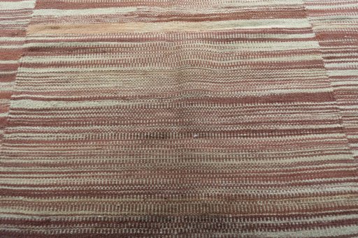 Backside of handmade New Kilim Kiasar rug showing knot structure and weave density