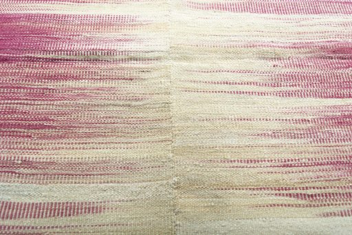 Backside of handmade New Kilim Kiasar rug showing knot structure and weave density