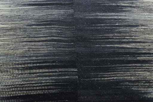 Backside of handmade New Kilim Kiasar rug showing knot structure and weave density