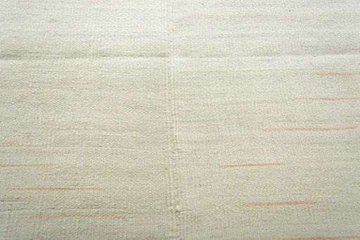 Backside of handmade New Kilim Kiasar rug showing knot structure and weave density