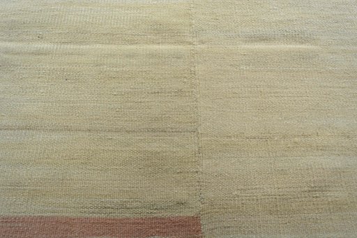 Backside of handmade New Kilim Kiasar rug showing knot structure and weave density