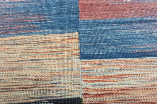 Backside of handmade New Kilim Kiasar rug showing knot structure and weave density